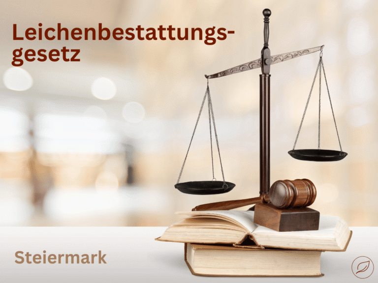 Beitragsbild zum Leichenbestattungsgesetz in der Steiermark mit Justizwaage, Richterhammer und Gesetzbuch
